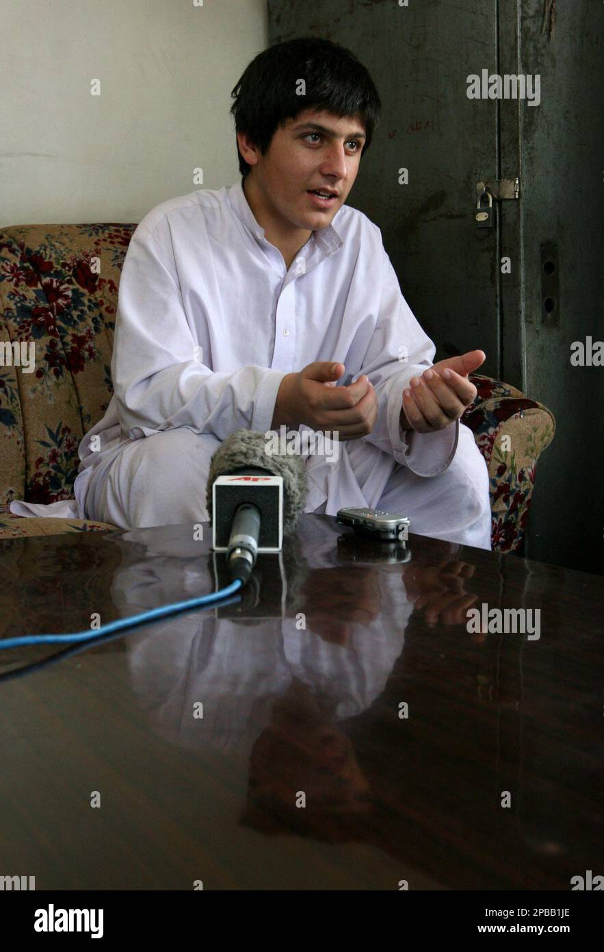 A failed Pakistani boy suicide bomber Rafiqullah, 14, gestures during ...