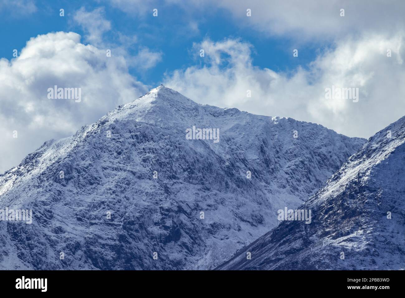 Snowdon mountain covered with snow, Snowdonia, North Wales Stock Photo