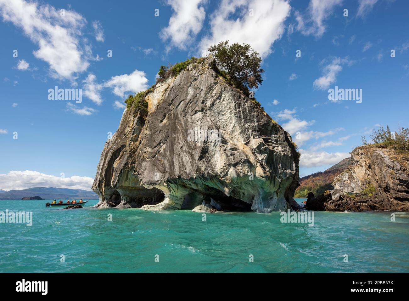 View of the eroded Marble Cave on the turquoise waters of Lago General