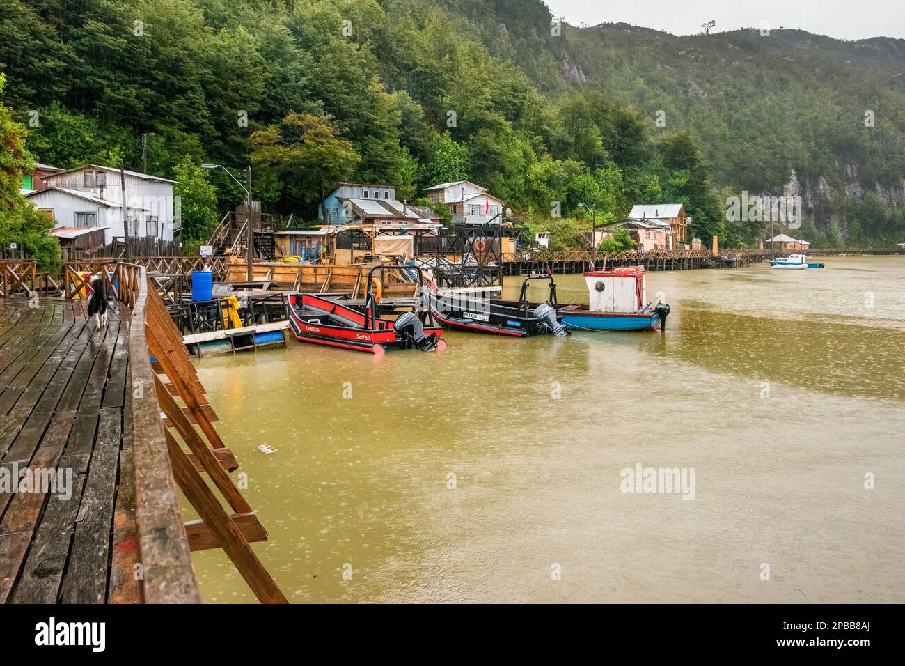 Tortel waterfront in the rain, Patagonia, Chile Stock Photo