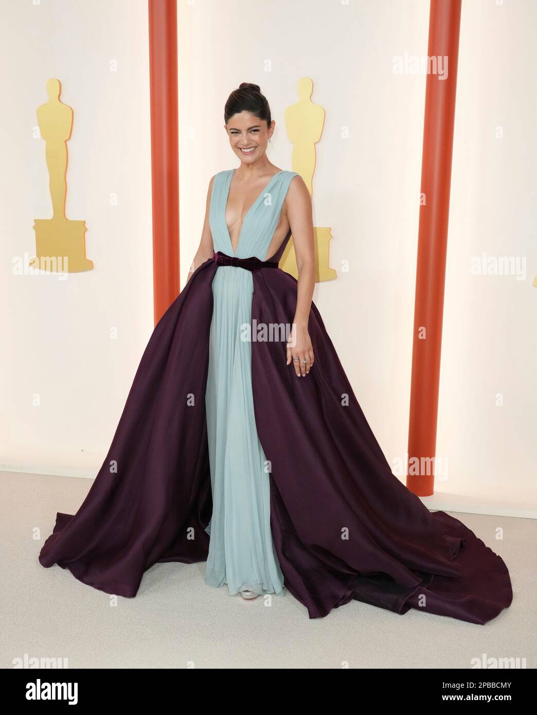 Monica Barbaro arrives at the Oscars on Sunday, March 12, 2023, at the