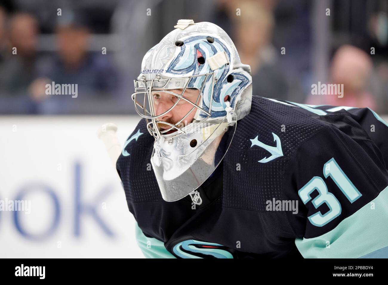 Seattle Kraken goaltender Philipp Grubauer (31) watches from the goal