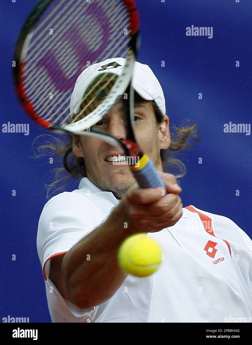 Gaston Gaudio from Argentina returns a ball during his match against  Kristof Vliegen from Belgiumat the Tennis Swiss Open tournament in Gstaad,  Switzerland, Monday, July 9, 2007. (AP Photo/Keystone, Peter Schneider Stock