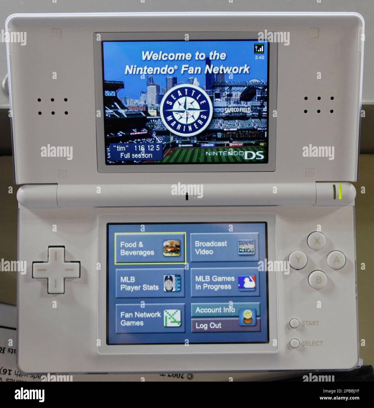 A Nintendo DS Lite portable game system is displayed at Safeco