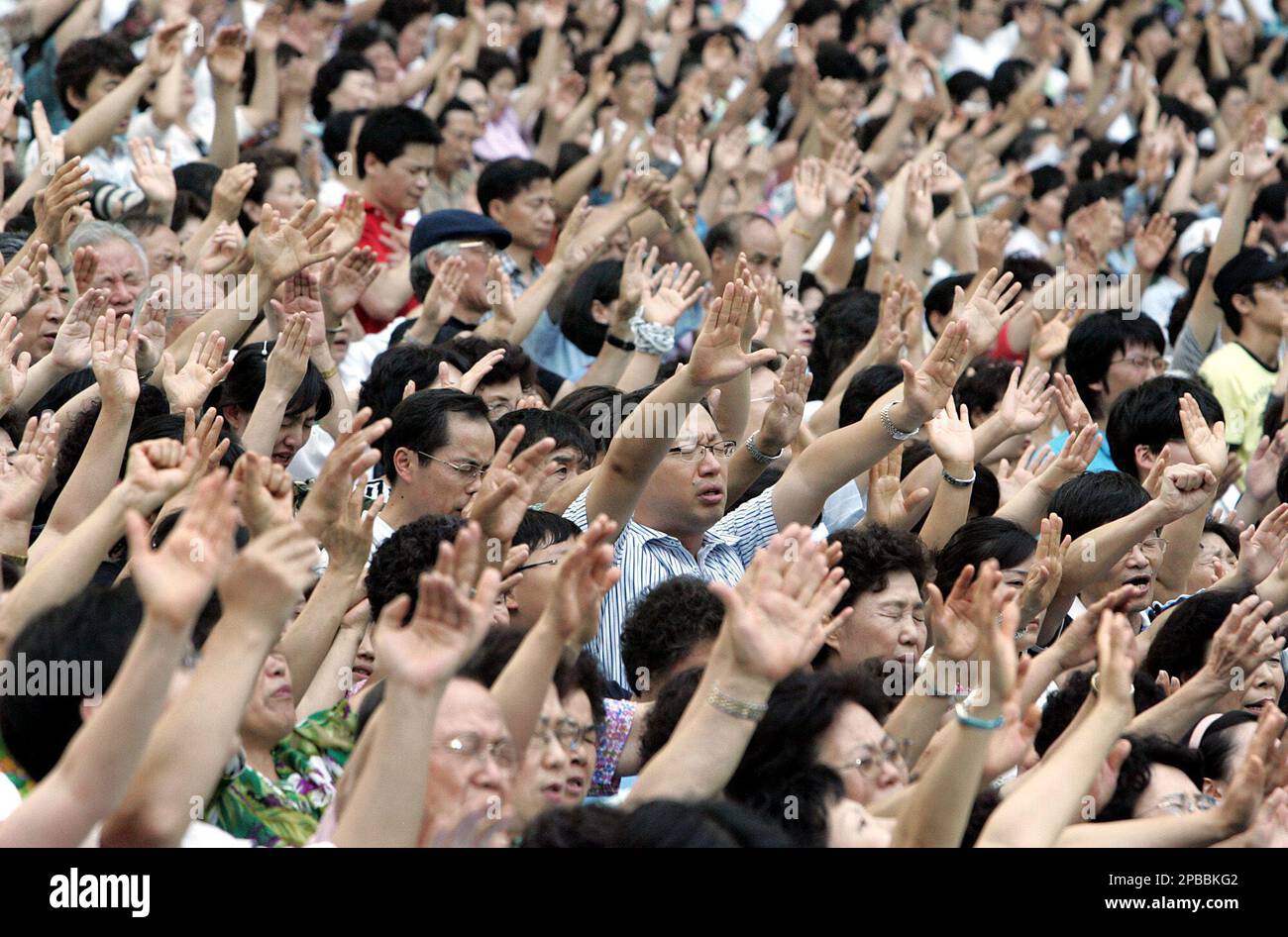 South Korean Christians pray during the 100th Anniversary Conference of ...