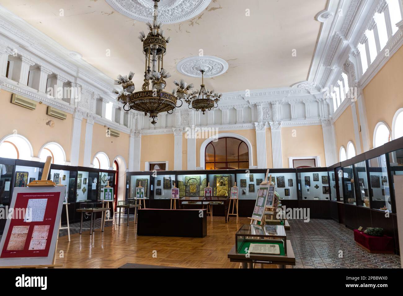 Kutaisi, Georgia, 04.06.21. Niko Berdzenishvili Kutaisi State History Museum, main exhibition room with glass old-style showcases. Stock Photo