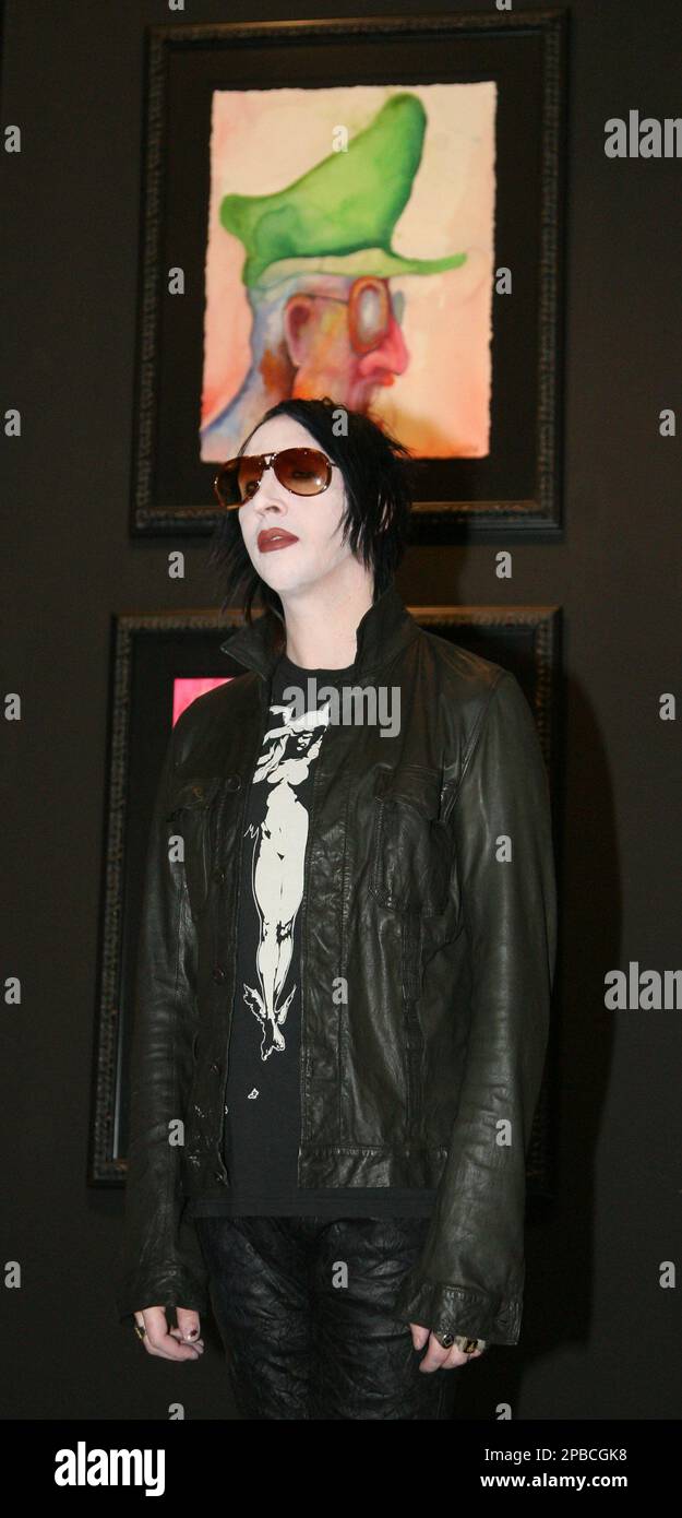 U.S. rock musician Marilyn Manson poses for photographers in a gallery ...
