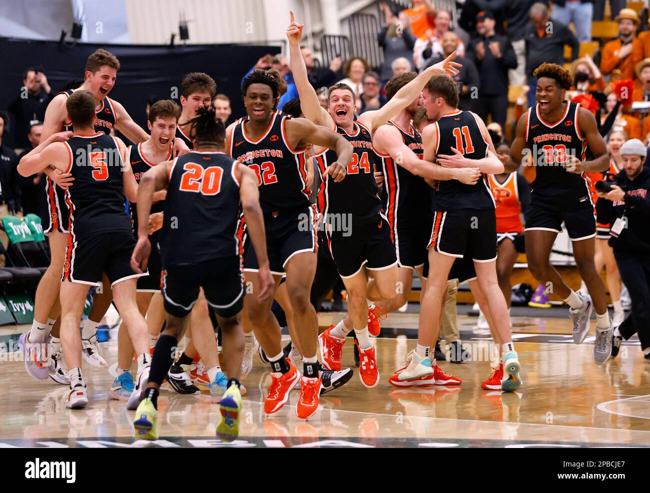 Princeton players celebrate after defeating Yale 7465 in the Ivy