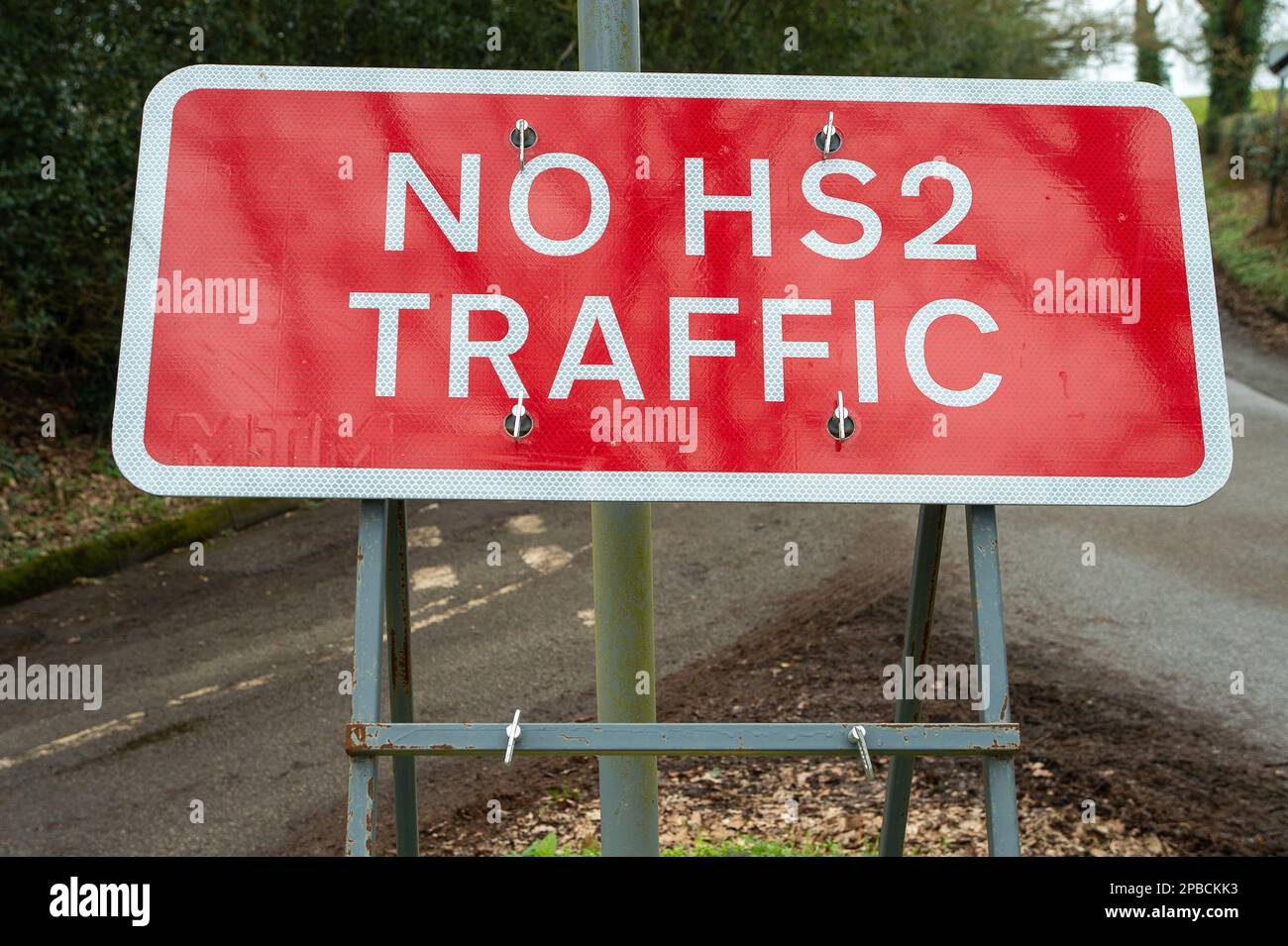 Wendover Dean, Buckinghamshire, UK. 12th March, 2023. A No HS2 traffic sign in the Chilterns. The High Speed Rail 2 Phase 1 construction work is carrying on, however, it has been announced this week that the Birmingham to Crewe phase of the HS2 has been put on hold due to escalating costs. The current costs of the project are hugely over budget and are expected to exceed 100 billion pounds. HS2 is having a hugely detrimental impact upon residents living along the line some of whom have had their houses demolished and farmers have had their land taken by HS2 but are allegedly yet to receive any Stock Photo