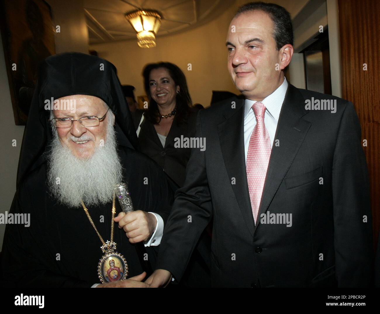Greek Prime Minister Costas Karamanlis, right, and Foreign Minister Greek Prime Minister Costas Karamanlis, right, and Foreign Minister