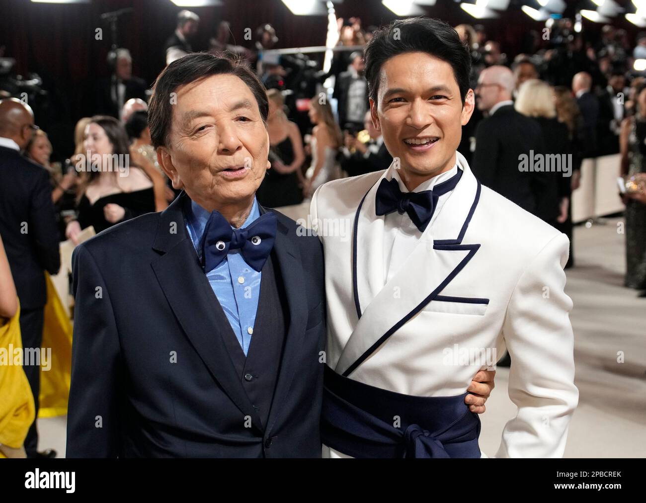 James Hong, left, and Harry Shum Jr. arrive at the Oscars on Sunday