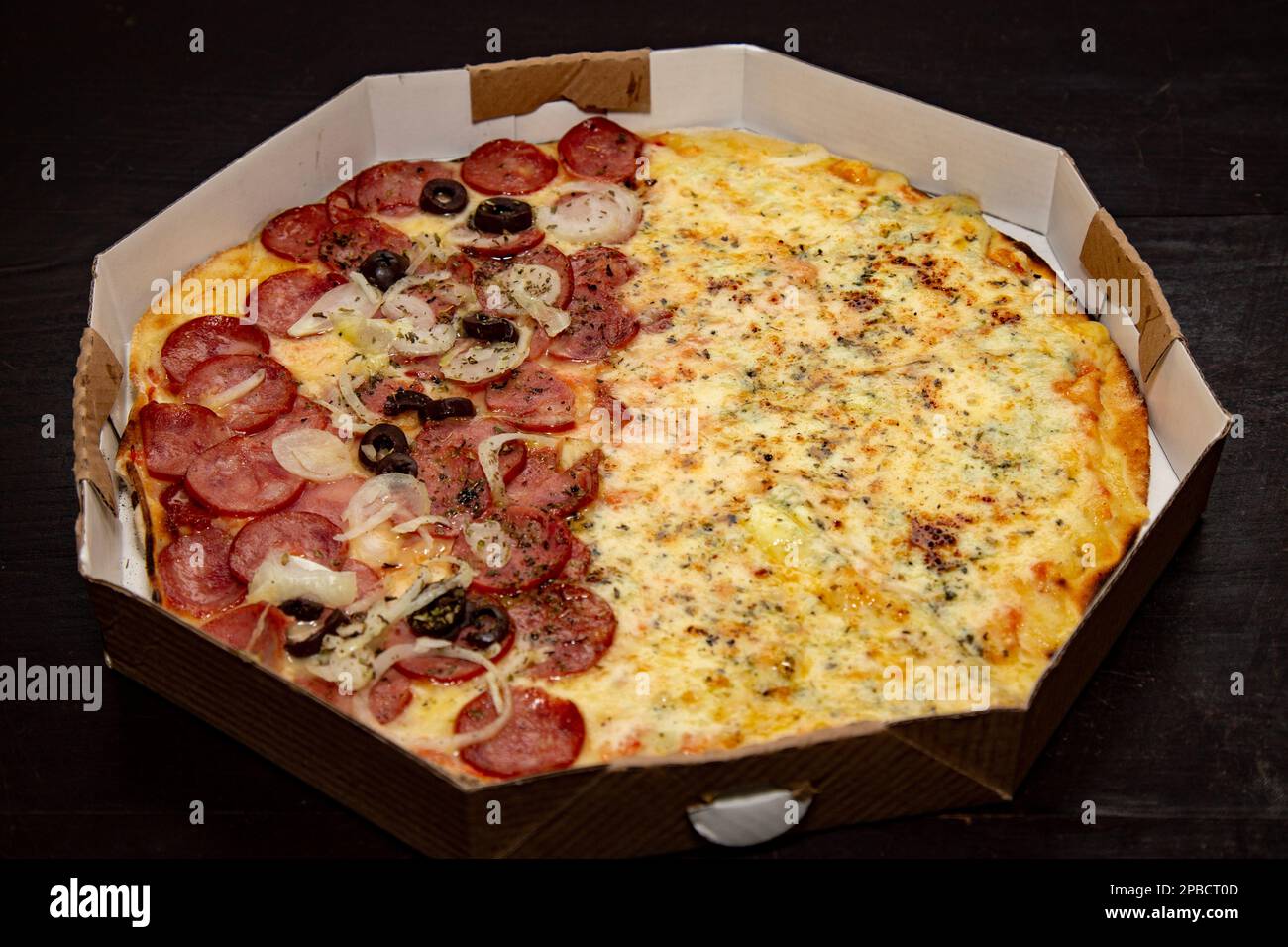 Traditional Brazilian pizza half pepperoni sausage and half four