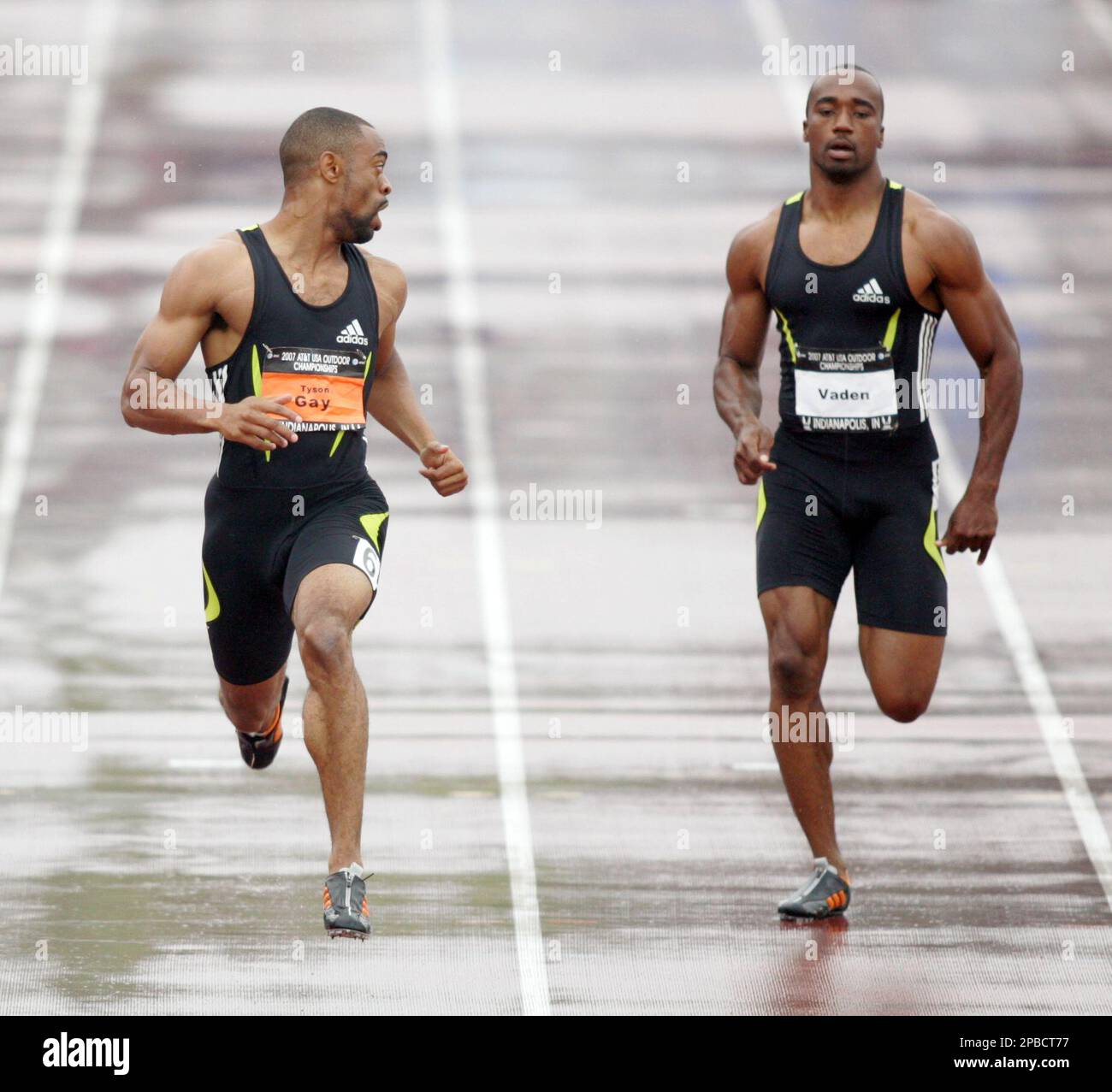 Tyson Gay left turns to check on fellow competitor Jordan Vaden