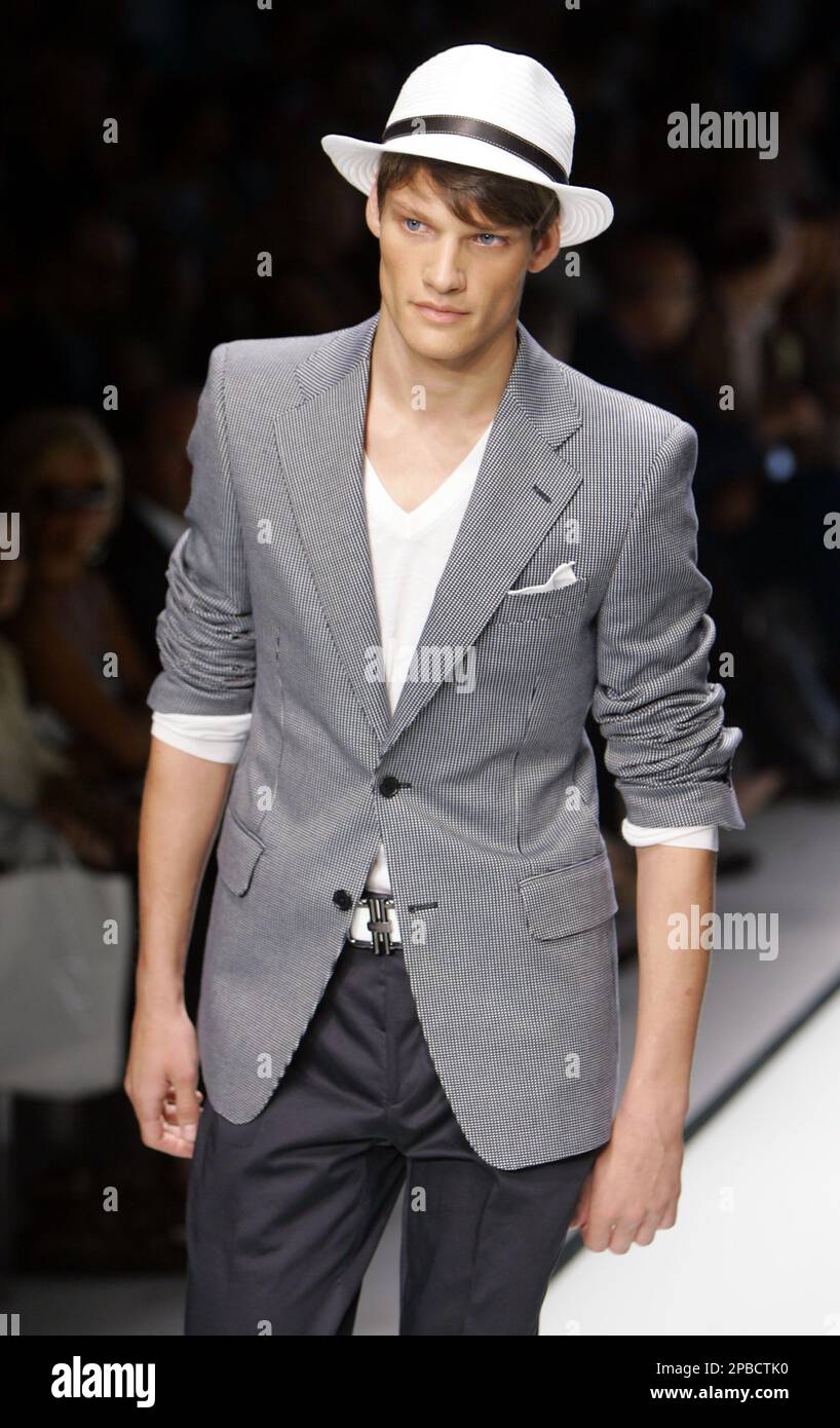 A model wears a creation as part of the Salvatore Ferragamo Spring/Summer  2008 men's collection, presented in downtown Milan, Italy, Sunday, June 24,  2007. (AP Photo/Antonio Calanni Stock Photo - Alamy