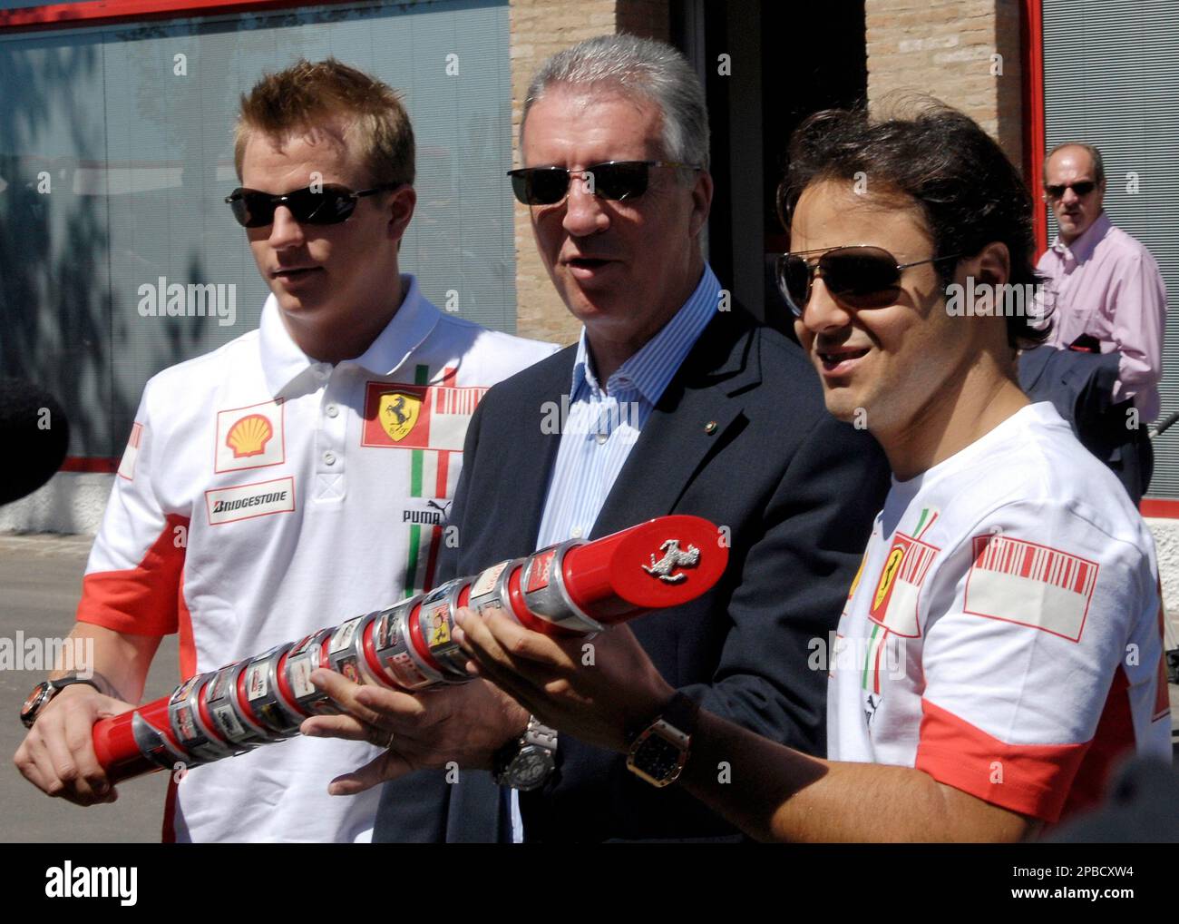 Ferrari Formula One drivers Felipe Massa, right, and Kimi 