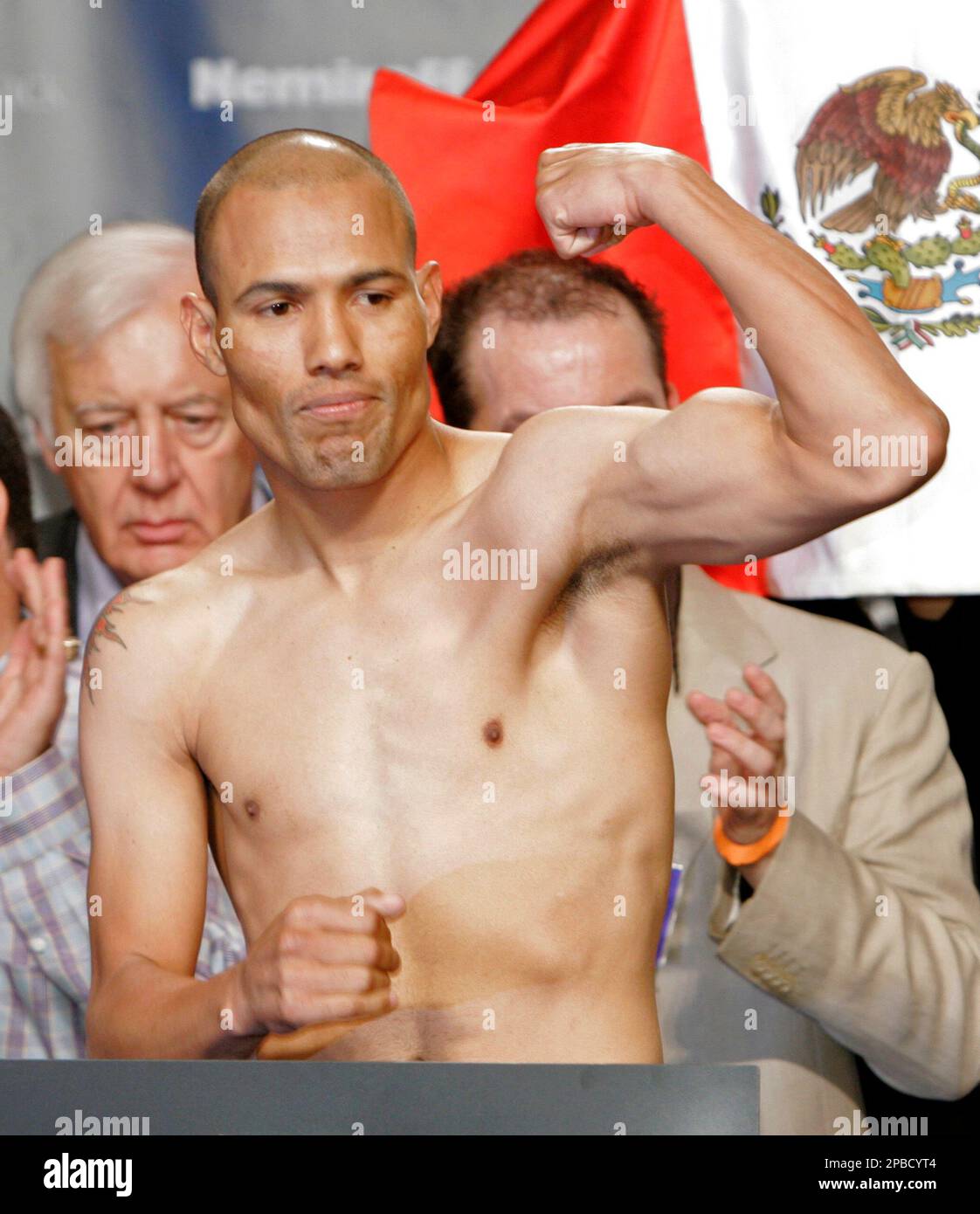 Boxer Jose Luis Castillo, of Mexico, flexes his muscles during an official  weigh-in ceremony at the Caesars Palace in Las Vegas, Friday, June 22,  2007. Castillo will fight Ricky Hatton, of England,