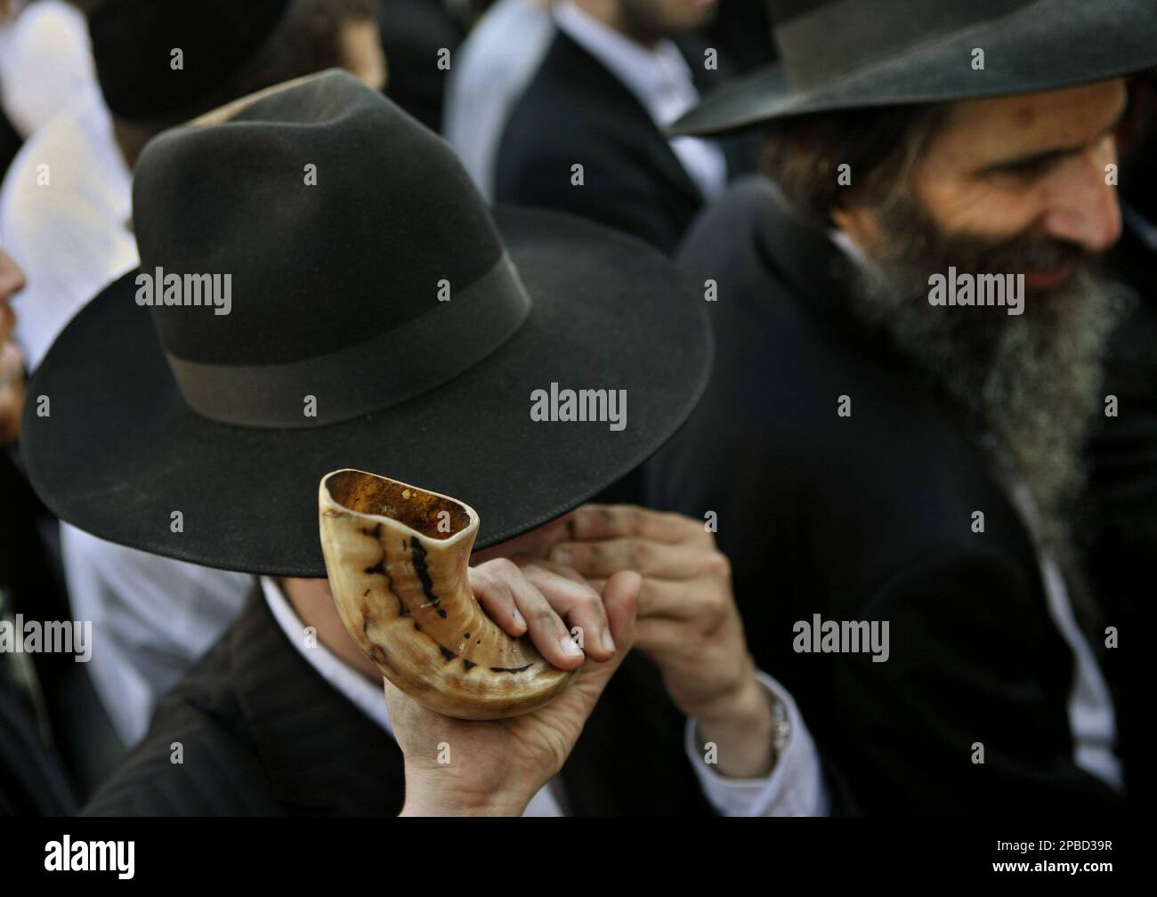 An Ultra-Orthodox Jewish protester blows a shofar during a prayer at a  demonstration against the Gay Pride Parade in Jerusalem, Thursday, June 21,  2007. Under heavy police guard, hundreds of gay activists