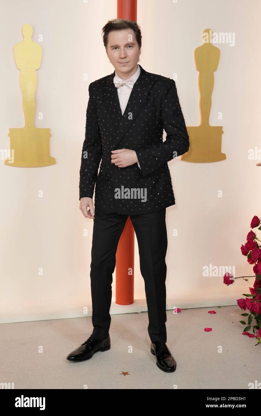 Paul Dano arrives at the Oscars on Sunday, March 12, 2023, at the Dolby