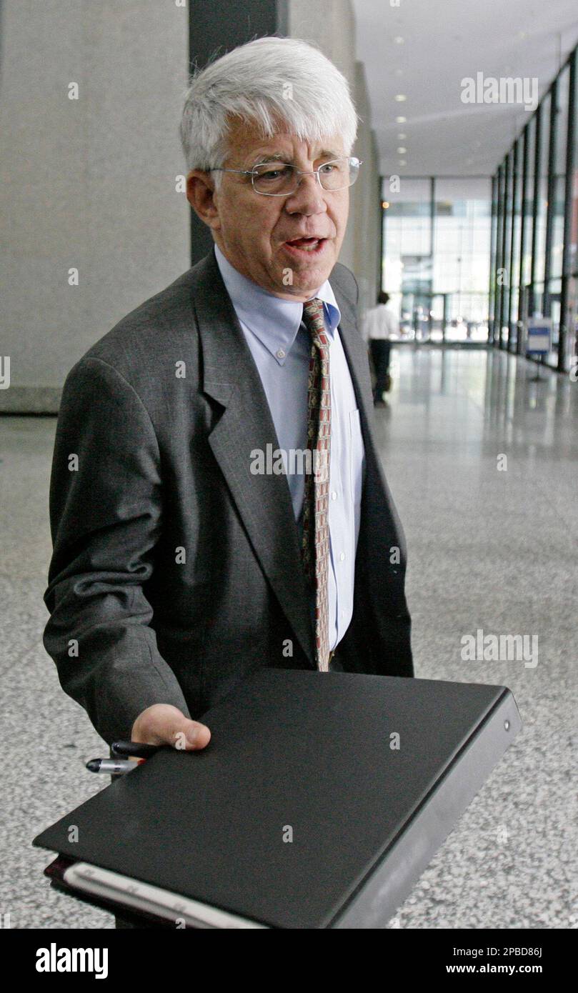 Thomas Breen attorney for James Marcello, an alleged member of Chicago's organized crime family The Chicago Outfit, talks to reporters before he heads into federal court as jury selection begins in the mob conspiracy trial Tuesday, June 19, 2007 in Chicago. Marcello is charged with racketeering conspiracy that included at least 18 murders. (AP Photo/M. Spencer Green) Stock Photo
