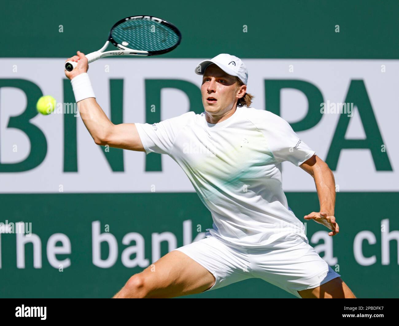 March 12, 2023 Emil Ruusuvuori of Finland returns a shot against Alexander  Zverev of Germany during the 2023 BNP Paribas Open at Indian Wells Tennis  Garden in Indian Wells, California. Mandatory Photo