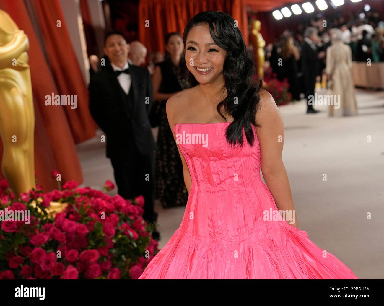 Stephanie Hsu arrives at the Oscars on Sunday, March 12, 2023, at the