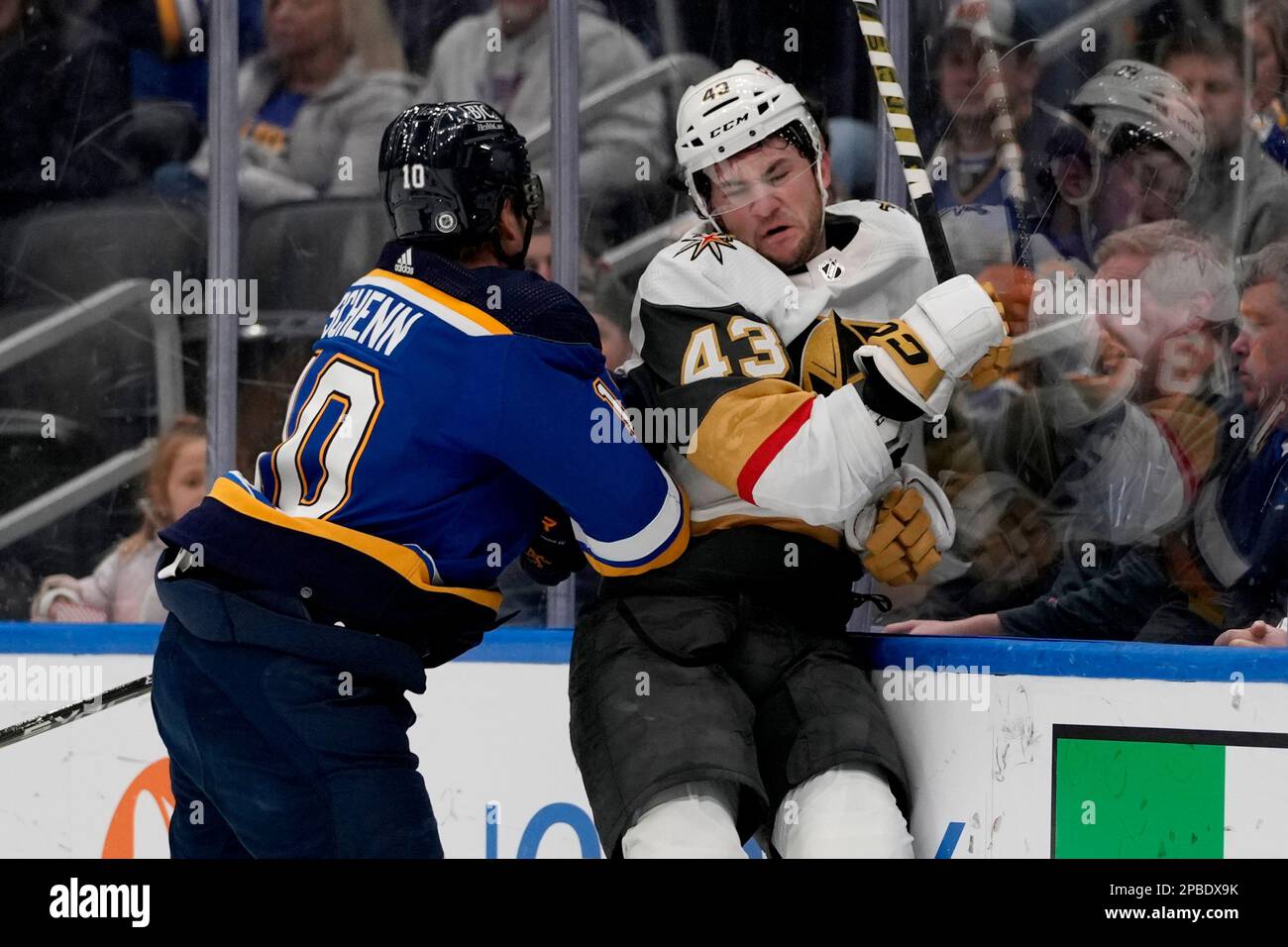 Vegas Golden Knights' Paul Cotter (43) is checked by St. Louis Blues