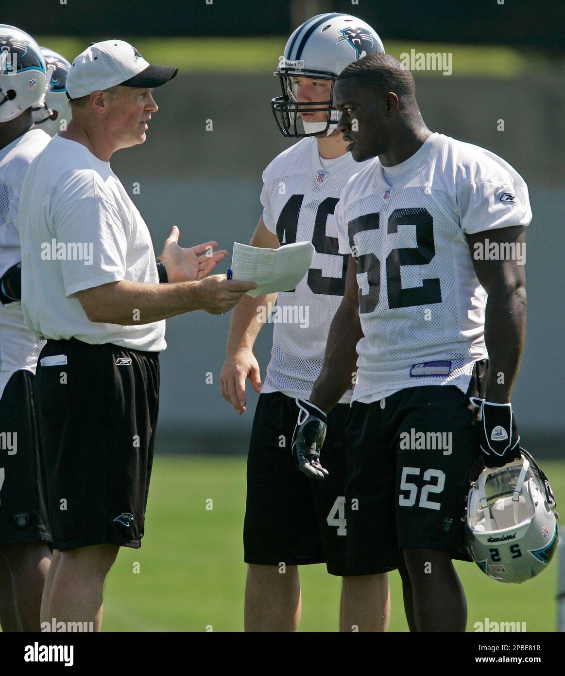 Carolina Panthers' Jon Beason, right, and Dan Morgan, left, work