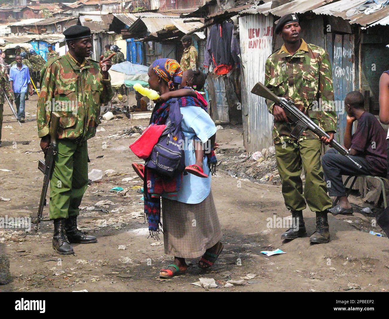 Kenyan paramilitary patrol the Mathare slum, in Nairobi, Kenya ...
