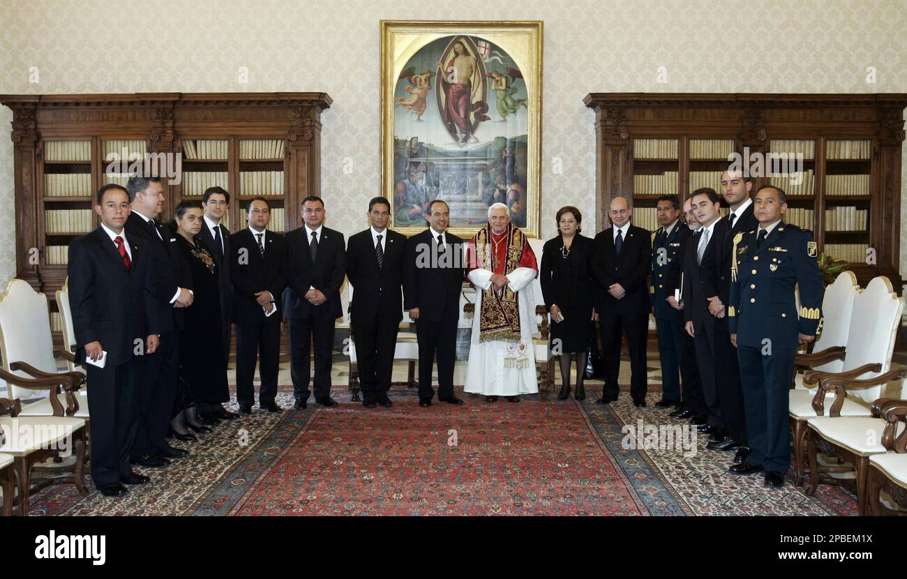 President of Mexico Felipe Calderon, at center immediately next to Pope Benedict XVI, poses for a photograph with the pontiff and members of his delegation, at the Vatican, Monday June 4, 2007. (AP Photo/Danilo Schiavella, POOL) Stock Photo