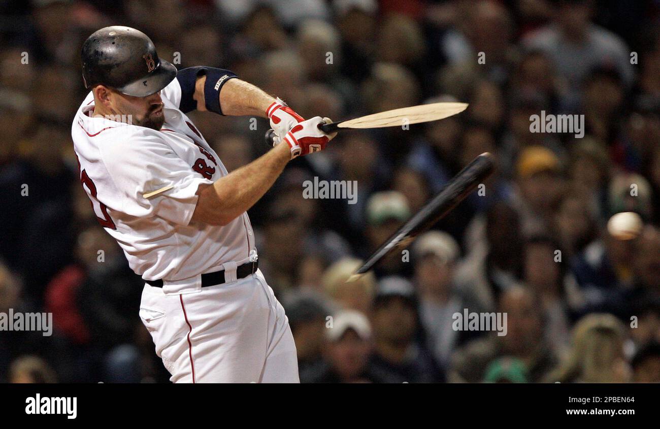 Boston Red Sox's Kevin Youkilis hits a broken-bat single against the New  York Yankees in the second inning of their baseball game at Fenway Park in  Boston Sunday, June 3, 2007. (AP
