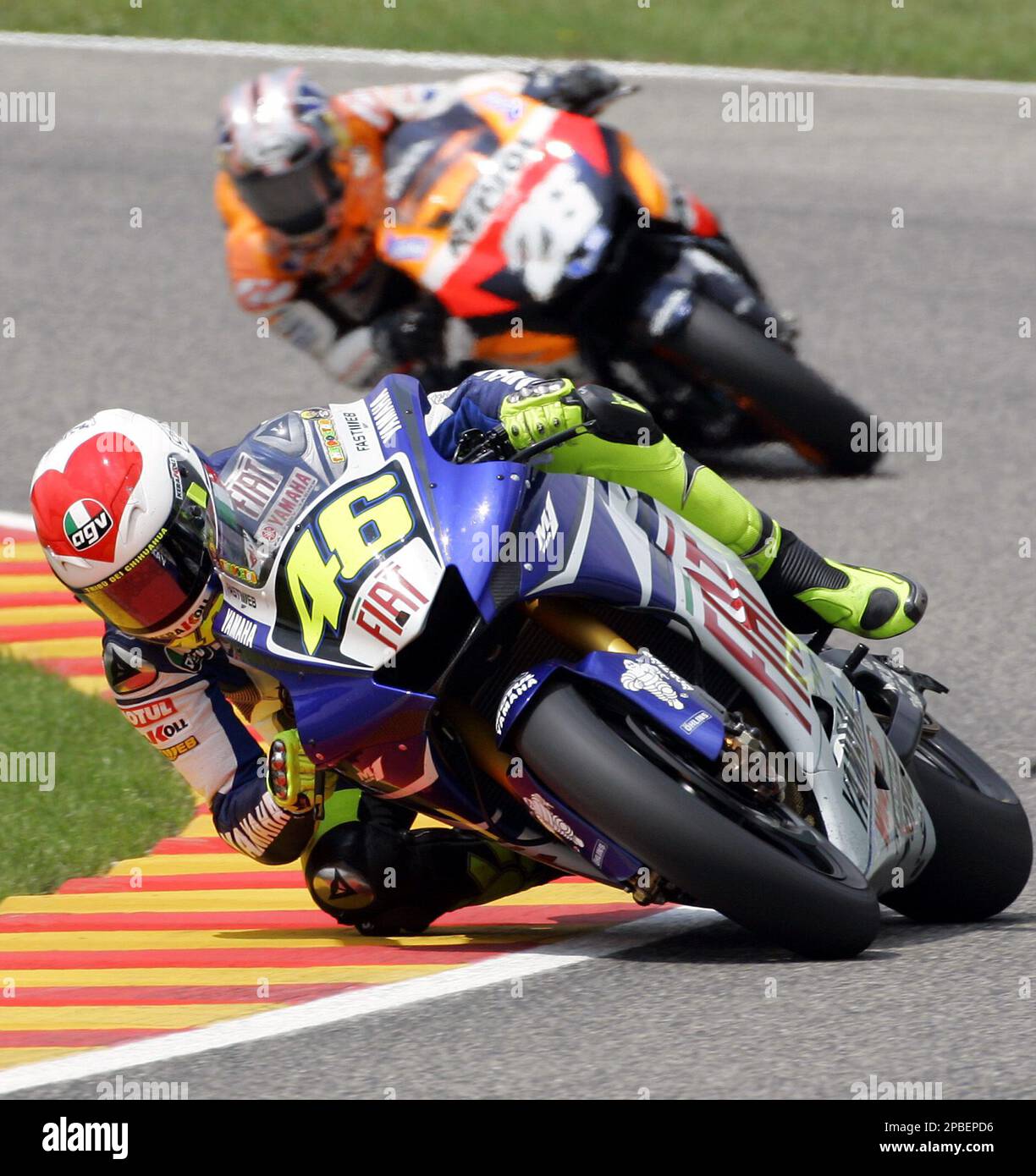 Yamaha driver Valentino Rossi, of Italy, leads Honda driver Dani Pedrosa,  of Spain, on a curve, during the Italian MotoGP, at the Mugello circuit, in  Scarperia, Italy, Sunday, June 3, 2007. Rossi