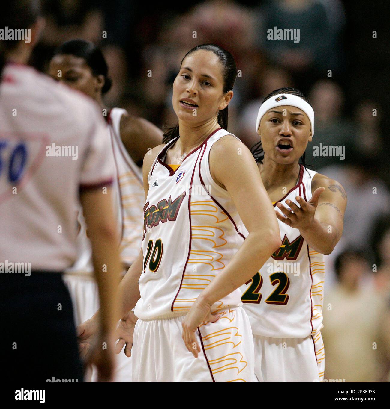 Seattle Storm's Sue Bird and Betty Lennox (22) appeal to