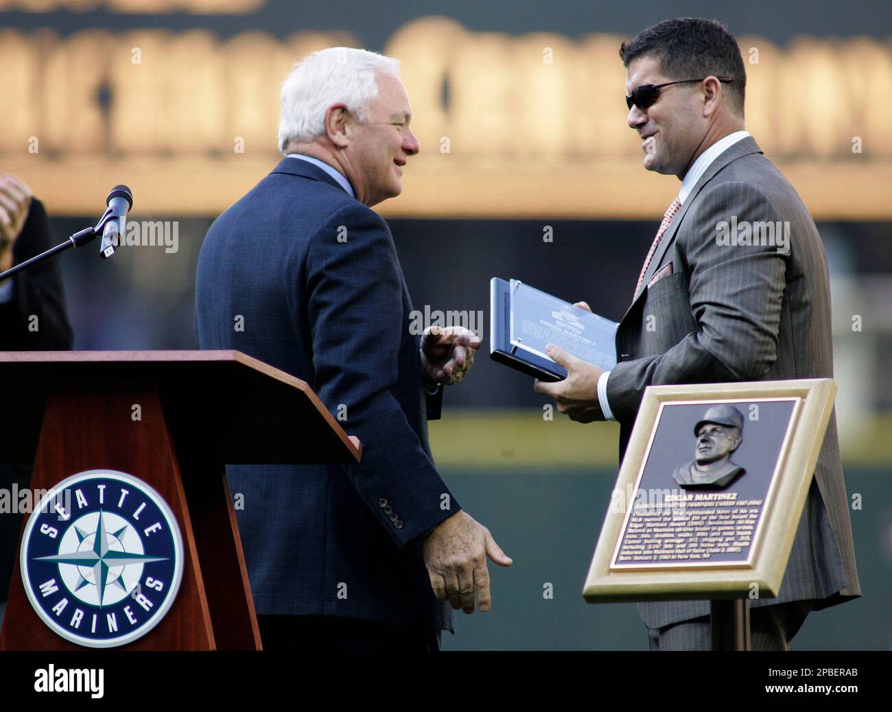 Edgar Martinez, of Puerto Rico, former Seattle Mariners designated hitter,  holds his daughter Tessa as he is honored and inducted into the Mariners  Hall of Fame, Saturday, June 2, 2007, before an