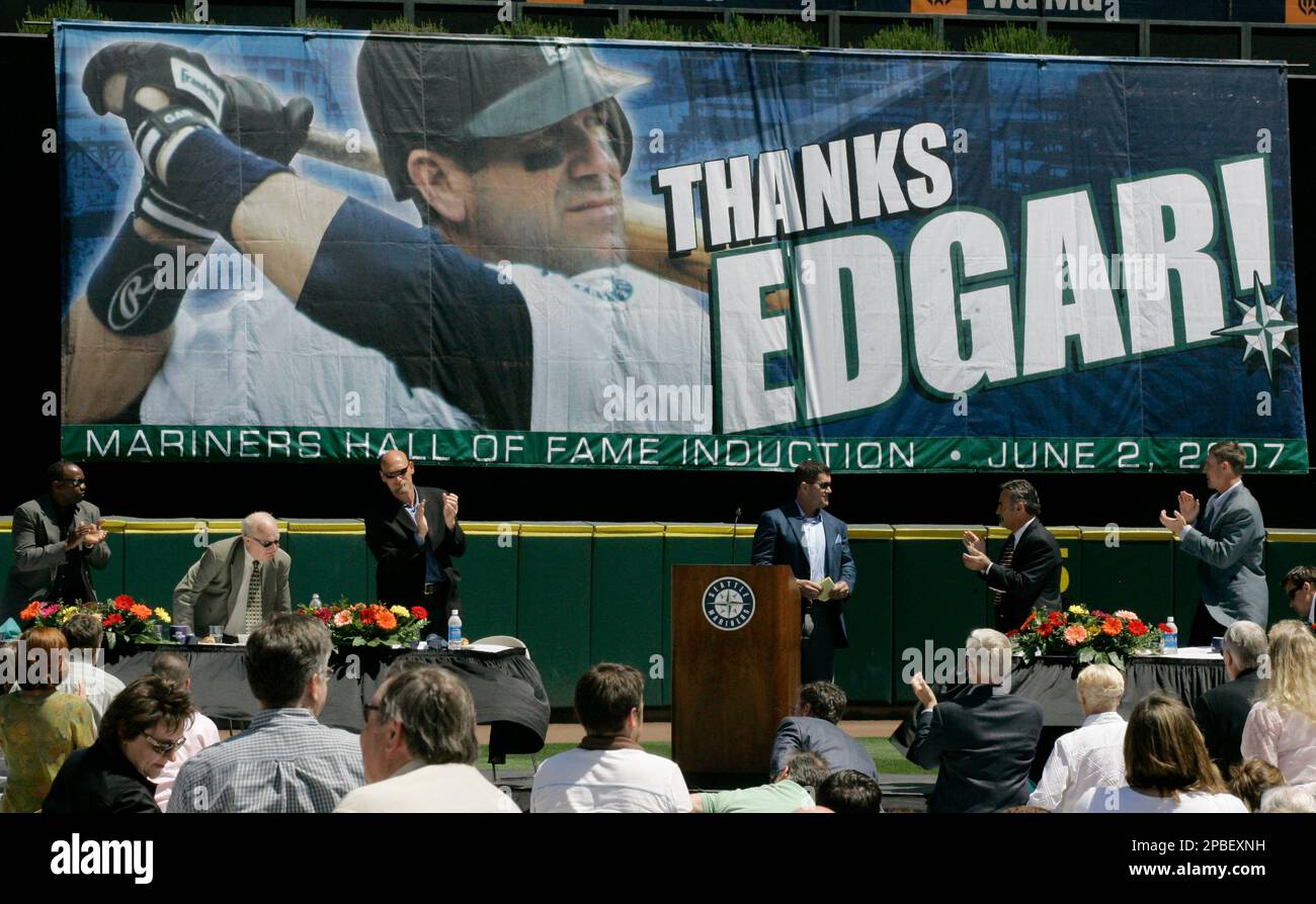 Seattle Mariners former designated hitter Edgar Martinez, center, is  honored Friday, June 1, 2007, at a luncheon at Safeco Field in Seattle.  Martinez, a native of Puerto Rico, will be inducted into