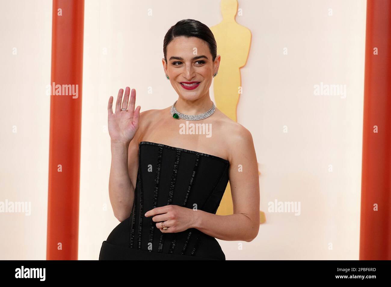 Jenny Slate arrives at the Oscars on Sunday, March 12, 2023, at the