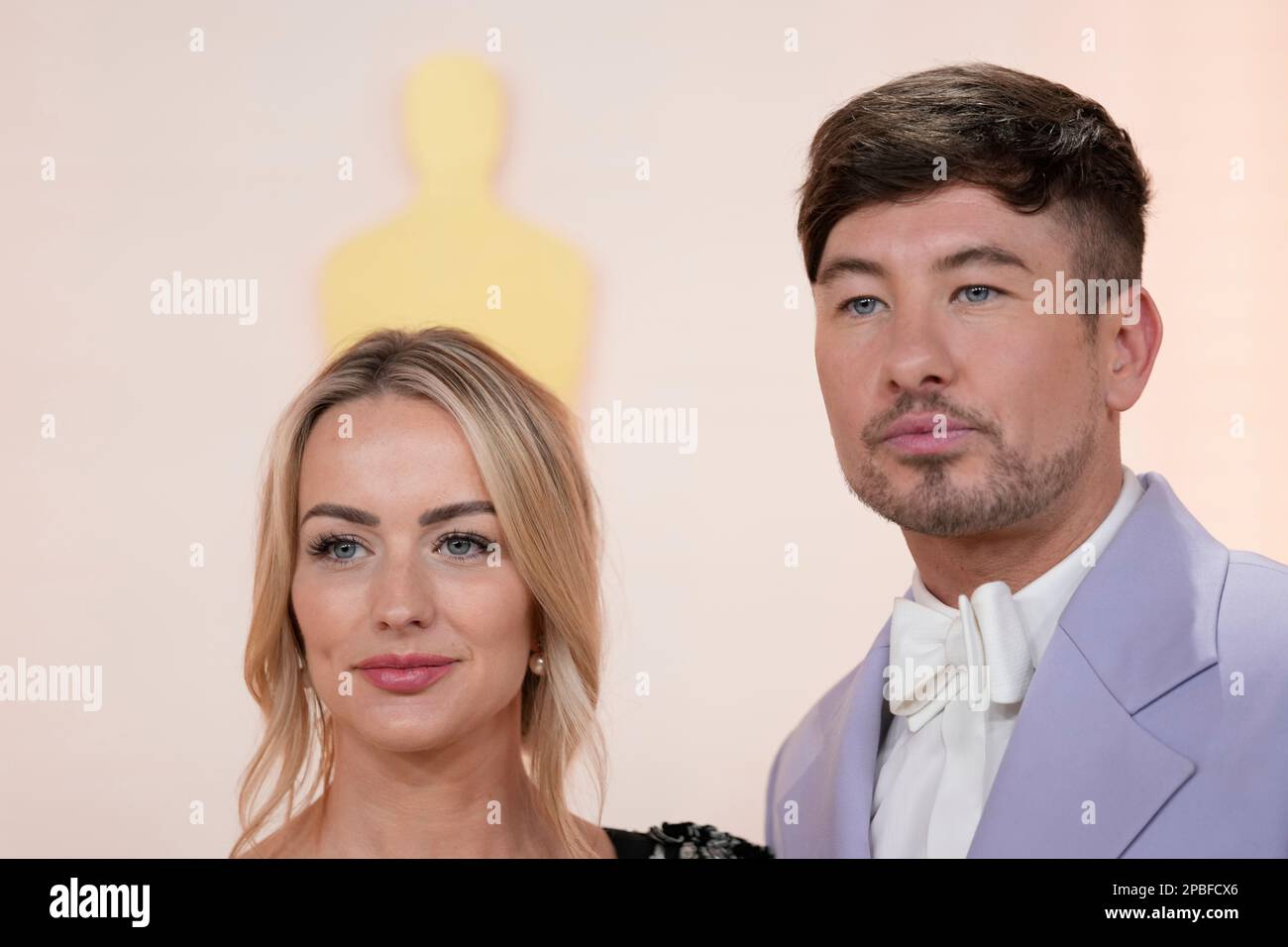 Alyson Kierans, left, and Barry Keoghan arrive at the Oscars on Sunday