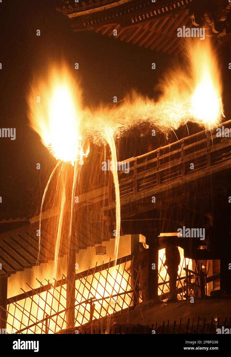 A long exposure photo shows the Omizutori ceremony, the Buddhist holy