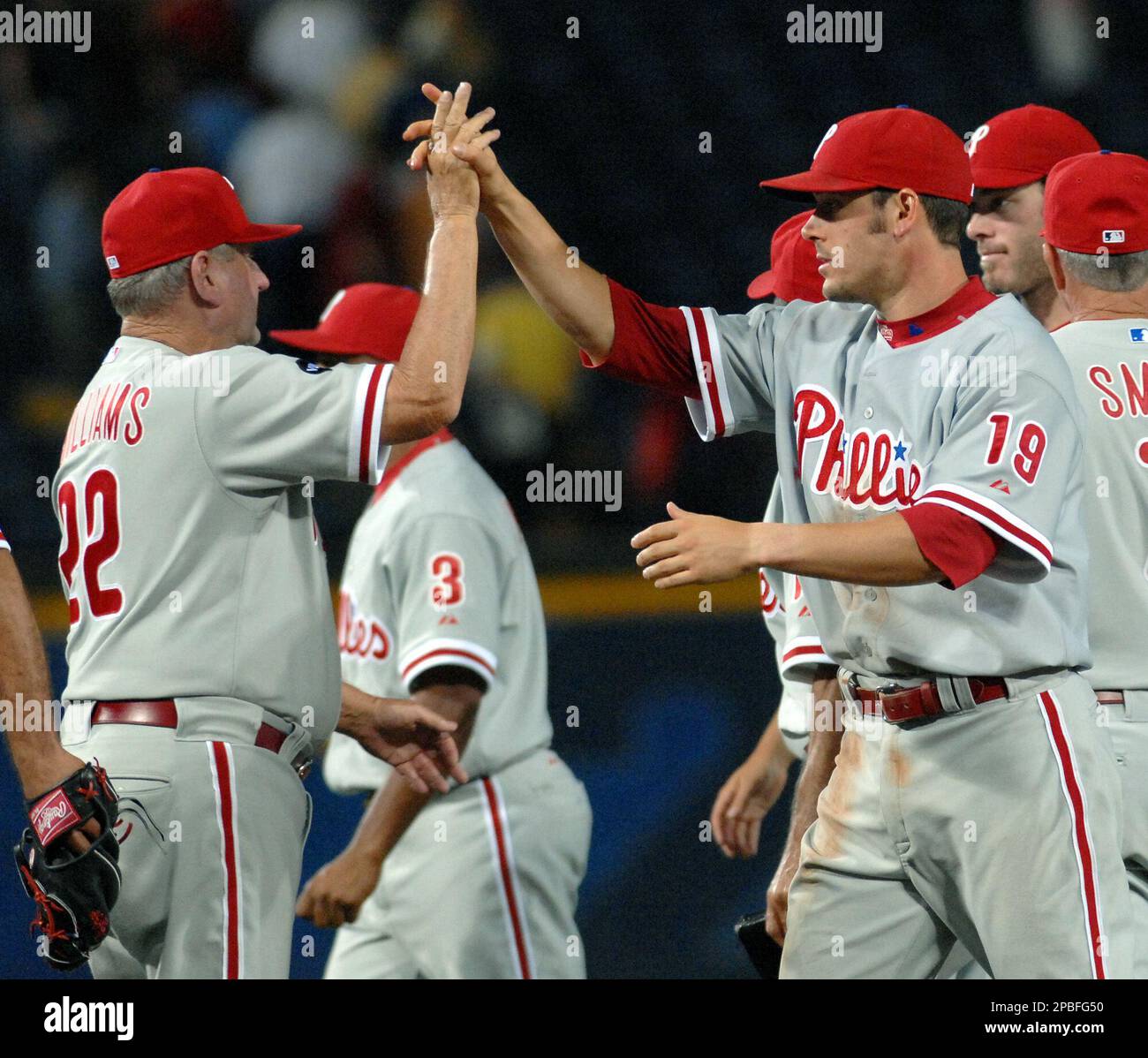 Philadelphia Phillies' Greg Dobbs (19) celebrates his-two run home