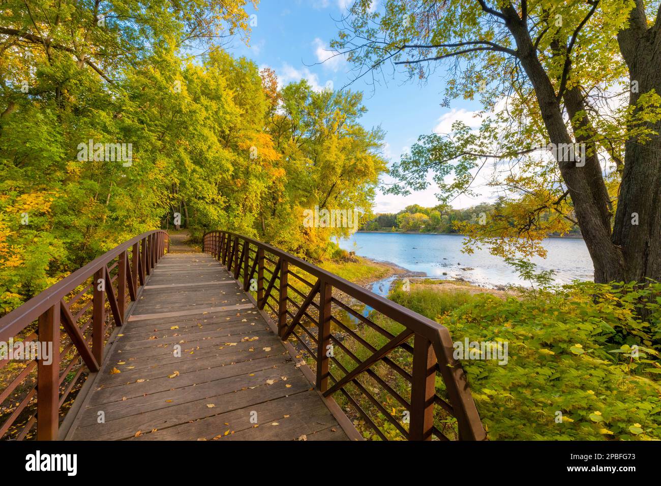 A bridge over Springbrook Creek in Fridley Minnesota where it flows