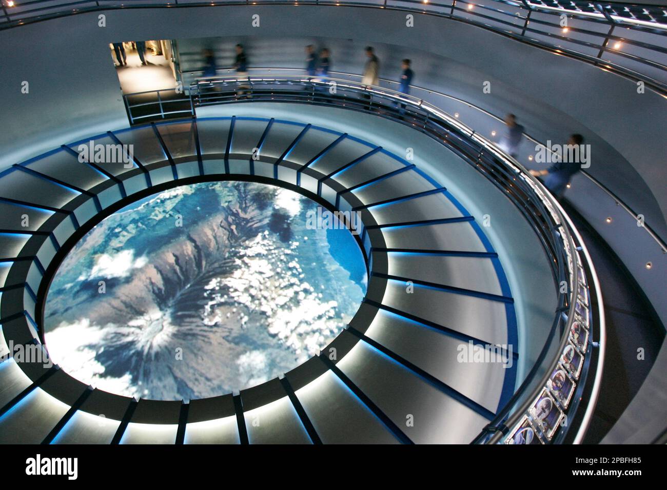 Former astronauts exit the Space Shuttle Experience launch simulator ...