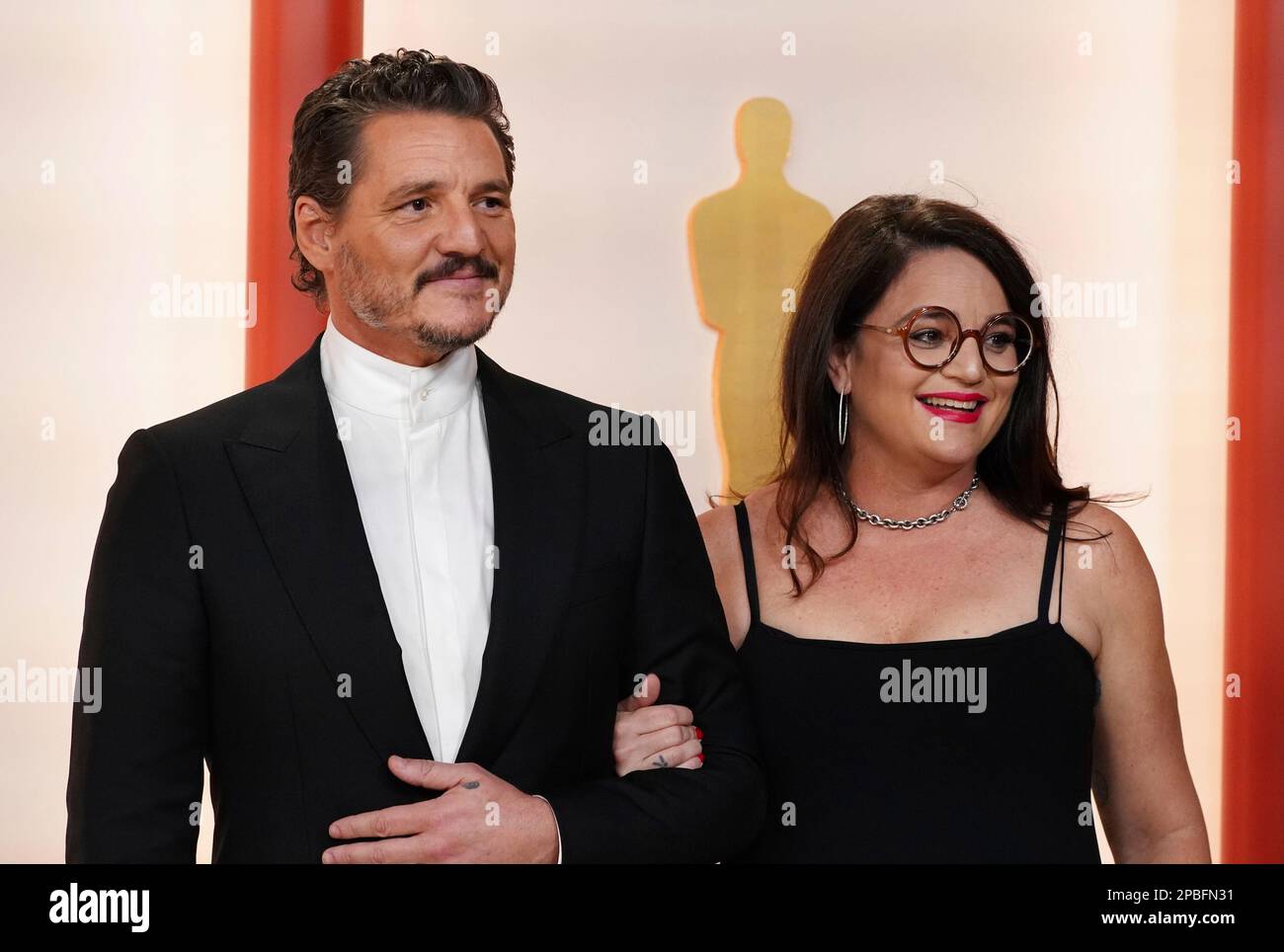 Pedro Pascal, left and Javiera Balmaceda arrive at the Oscars on Sunday
