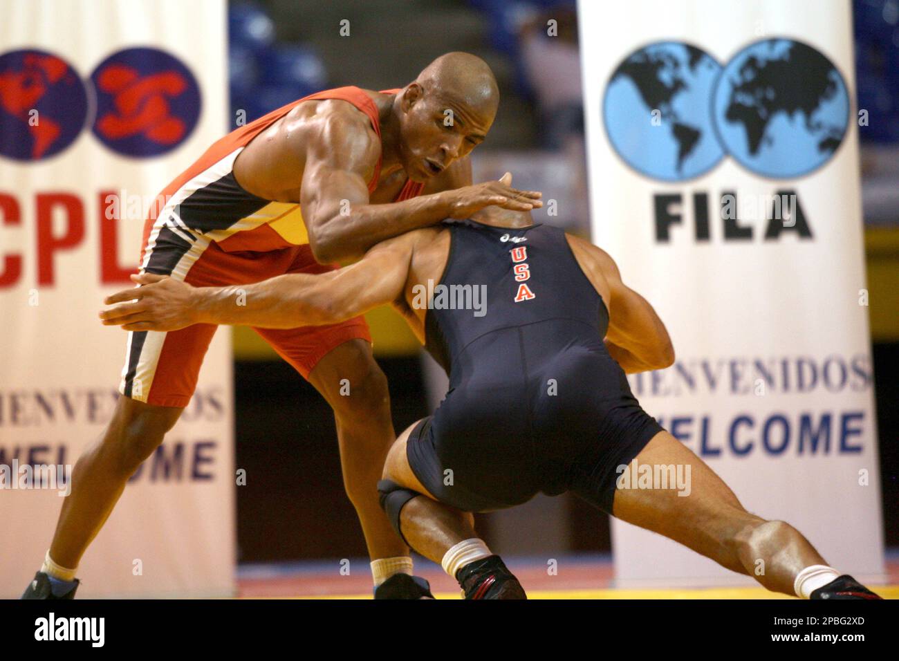 Cuba s Ivan Fundora right wrestles U.S. Joe Hashett in the 74 kg