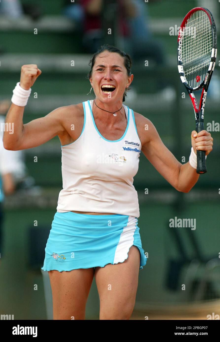 Italy's Nathalie Vierin celebrates after defeating Russia's Galina  Voskoboeva during the Rome Masters tennis tournament in Rome's Foro Italico  clay-court, Wednesday, May 16, 2007. Vierin won 4-6, 6-4, 6-4. (AP  Photo/Felice Calabro'
