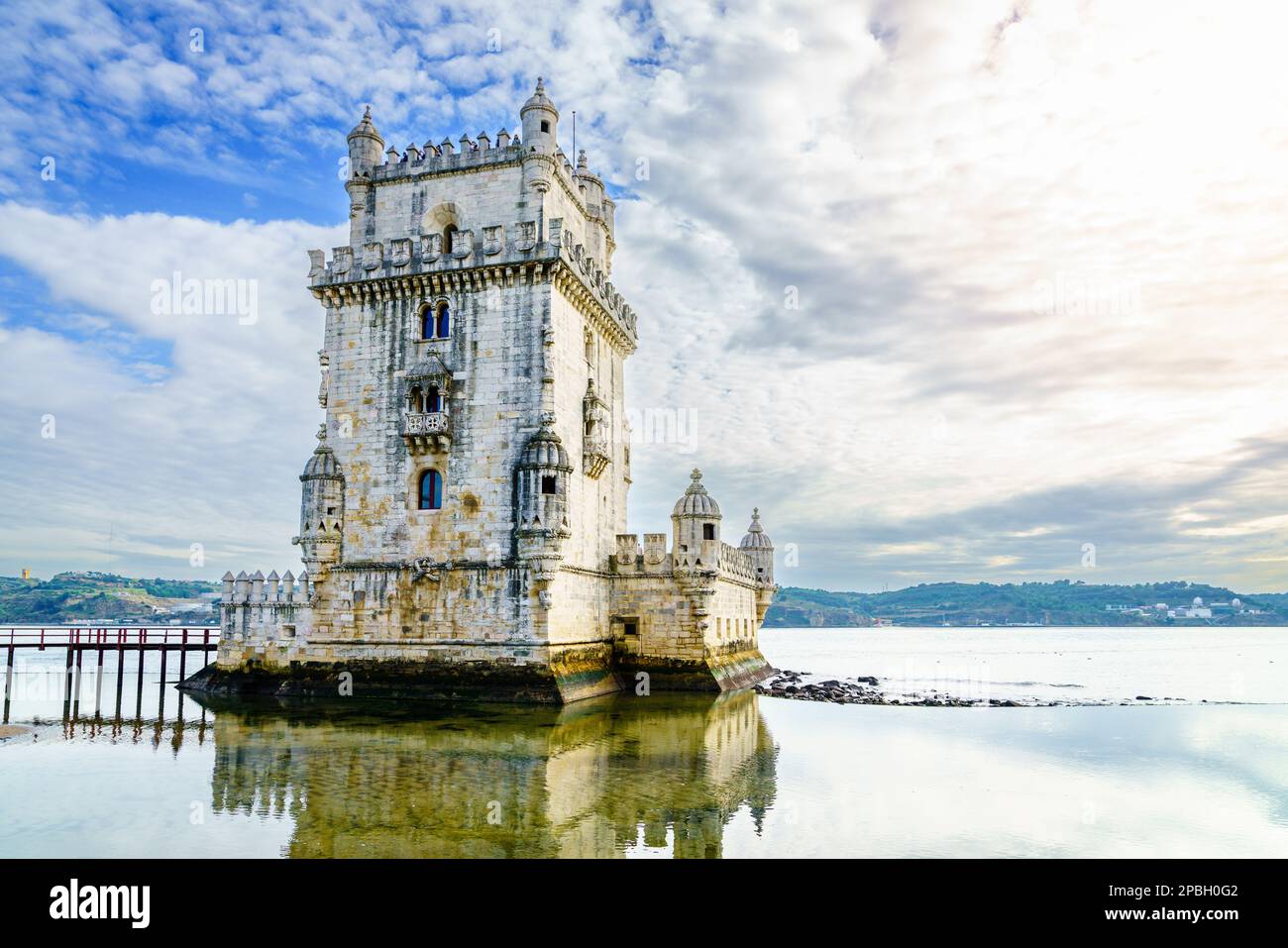 View of Torre de Belem or Bethlehem Tower against the Tagus River in Lisbon, Portugal Stock Photo