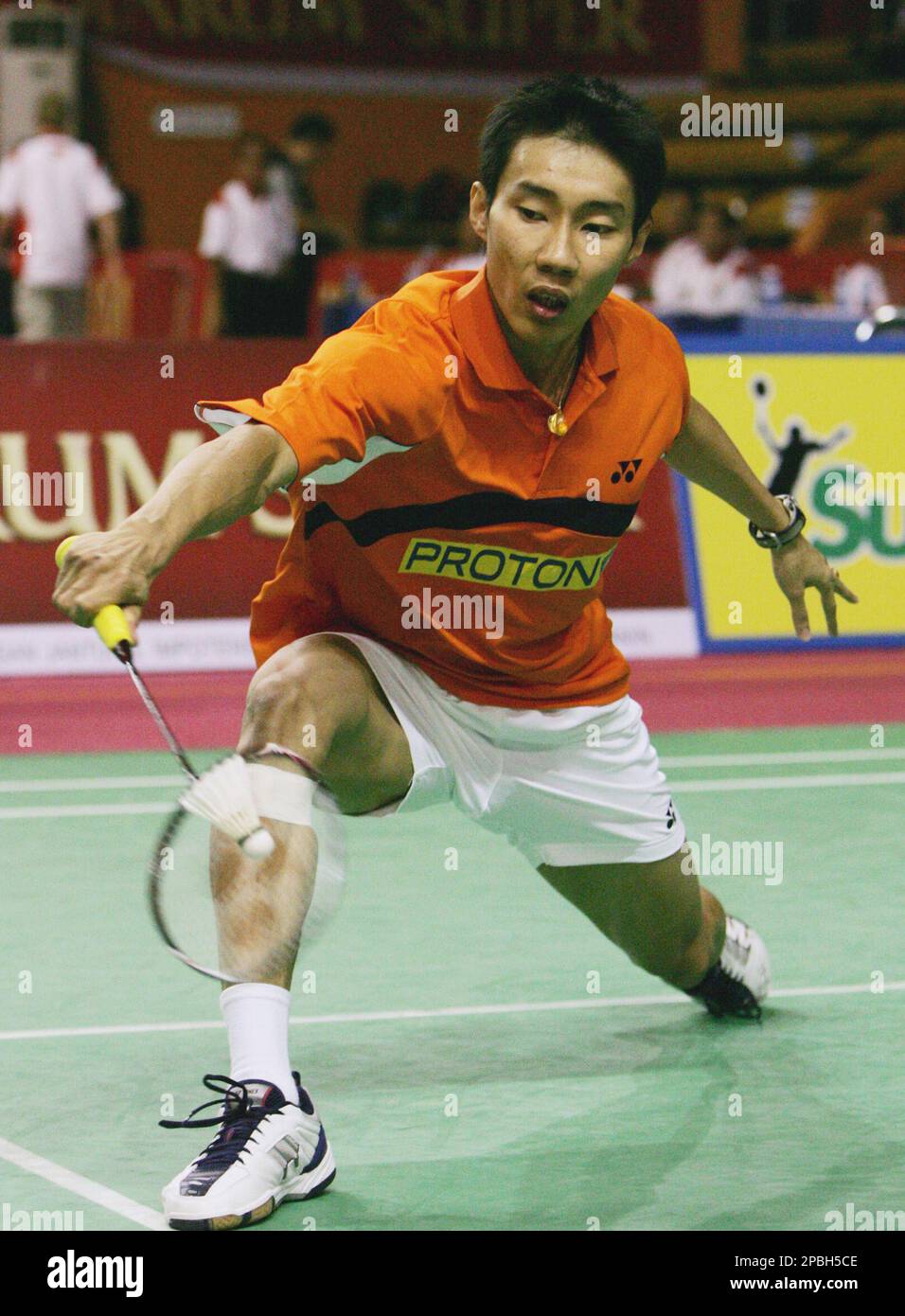 Lee Chong Wei from Malaysia returns a shot against Bao Chunlai 