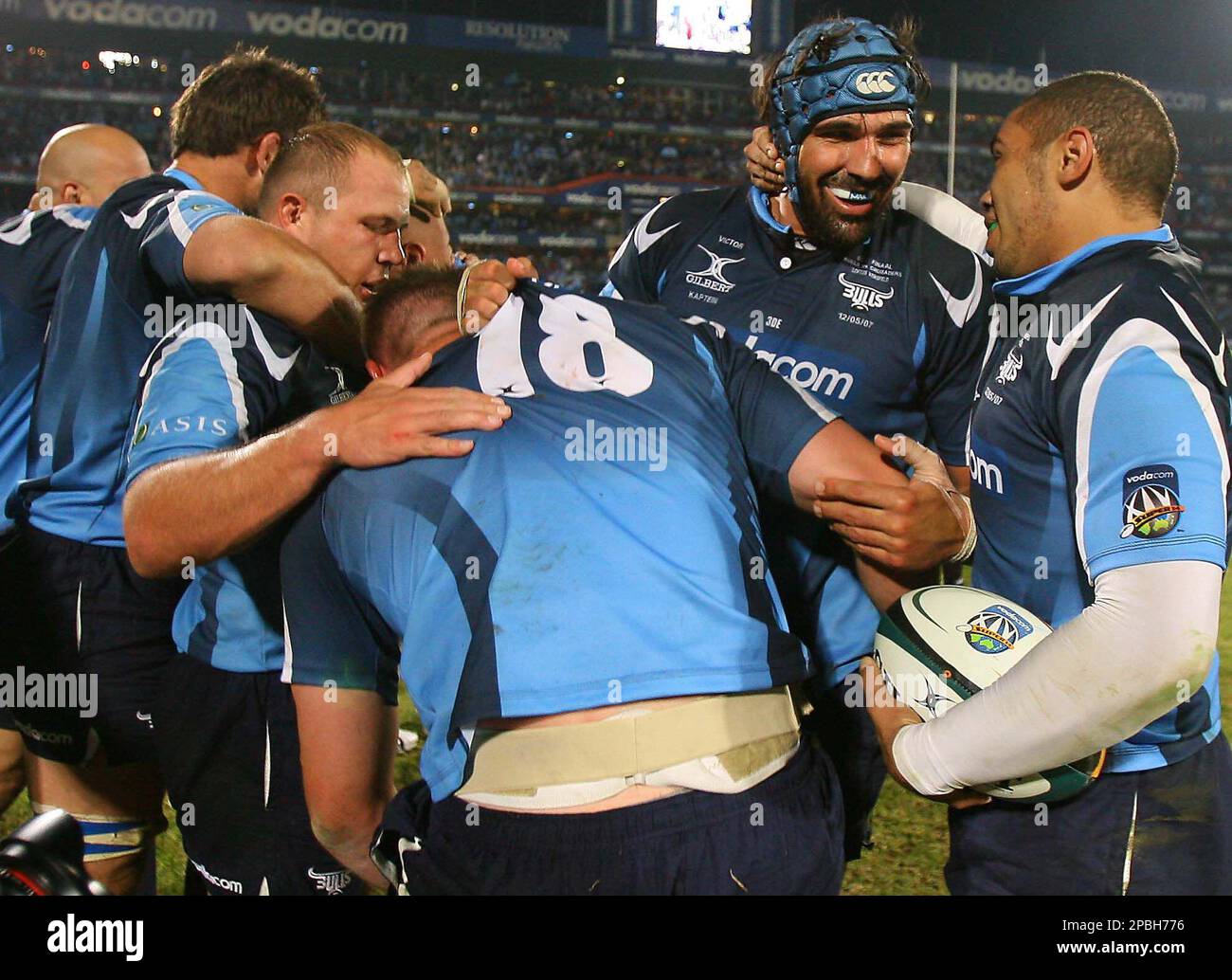 Bulls Captain Victor Matfield, second right, is congratulated by team mates after the Bulls beat the Crusaders 27-12 in the second Super14 semi-final held at Loftus Versveld, Pretoria, South Africa, Saturday May
