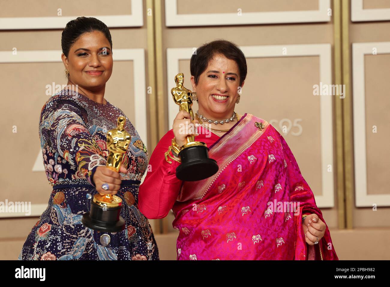 Kartiki Gonsalves and Guneet Monga pose with the Oscar for Best Documentary Short Film for 'The Elephant Whisperers' in the Oscars photo room at the 95th Academy Awards in Hollywood, Los Angeles, California, U.S., March 12, 2023. REUTERS/Mike Blake Stock Photo