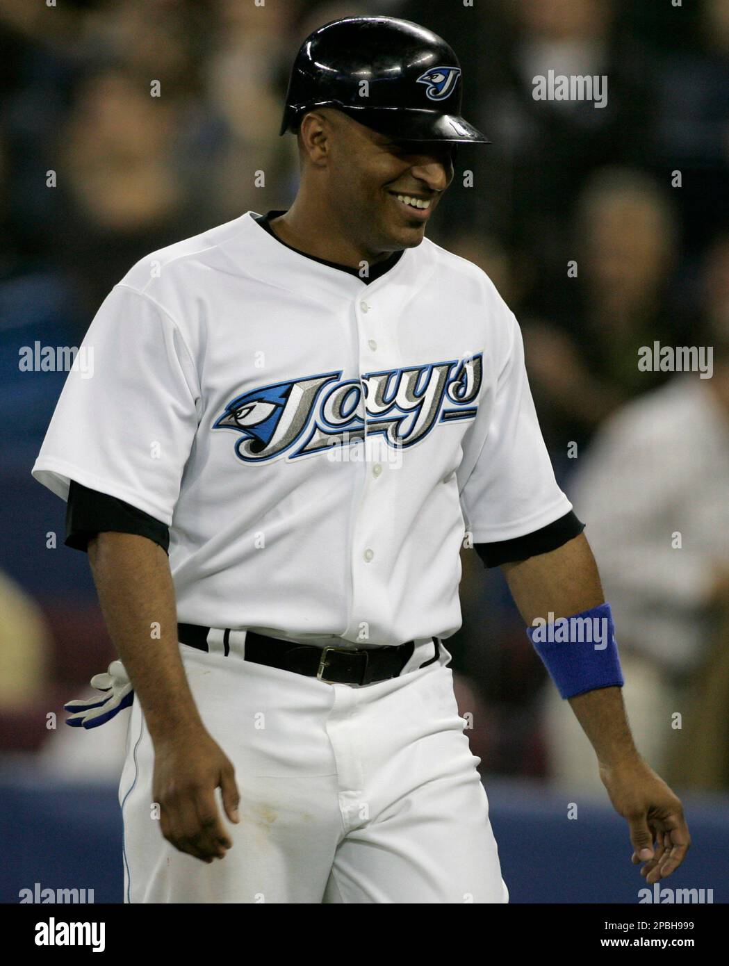 The Toronto Blue Jays centerfielder, Vernon Wells (10) is all smiles as he  rounds the bases after his two run home run blast during the first inning  of Monday's Opening Day baseball