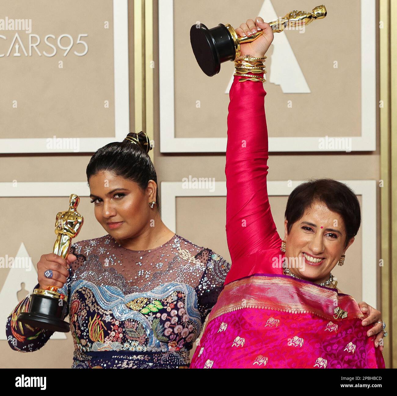 Kartiki Gonsalves and Guneet Monga pose with the Oscar for Best Documentary Short Film for 'The Elephant Whisperers' in the Oscars photo room at the 95th Academy Awards in Hollywood, Los Angeles, California, U.S., March 12, 2023. REUTERS/Mike Blake Stock Photo