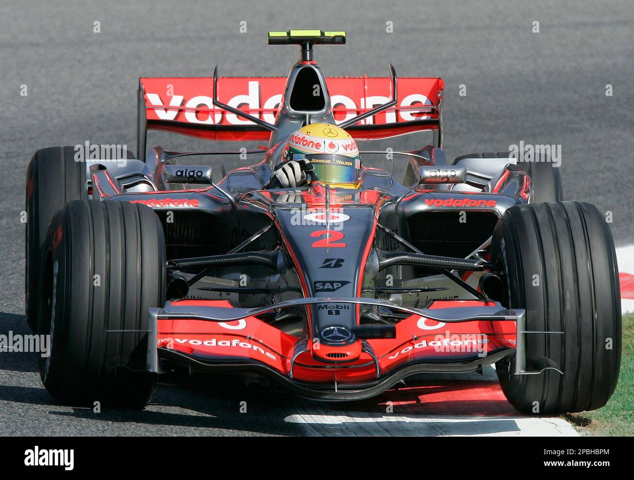 British Formula One Driver Lewis Hamilton Steers His McLaren Mercedes british-formula-one-driver-lewis-hamilton-steers-his-mclaren-mercedes